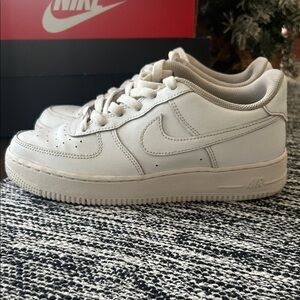 All white Nike Air Force Ones size 6.5Y